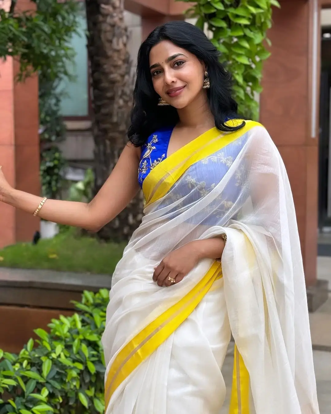 Aishwarya Lekshmi Wearing White Saree Blue Sleeveless Blouse